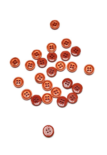 Кликните для увеличения изображения Пуговица рубашечно-блузочная красная 10 мм