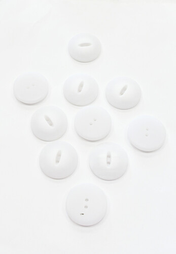 Пуговица пластик на прокол белая 33 мм